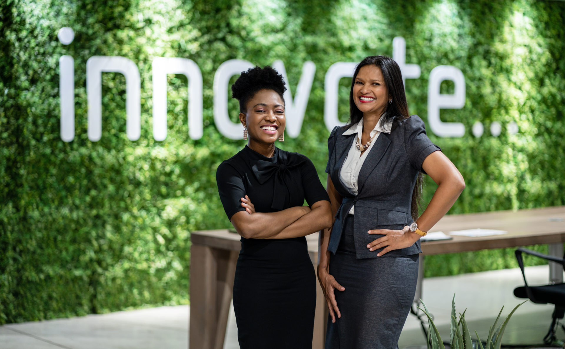 Two Black innovative women at work 